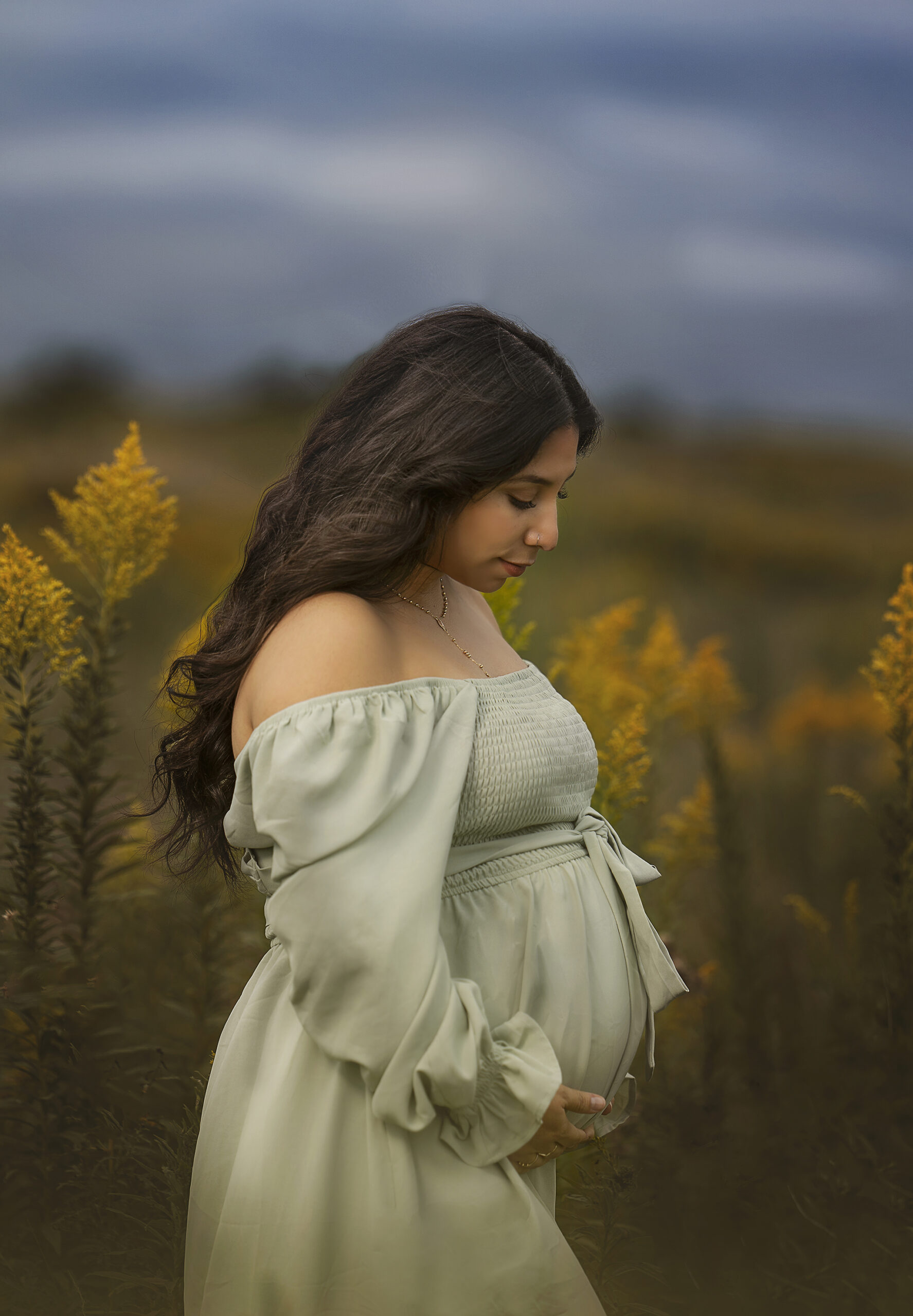 Pregnant women in a field